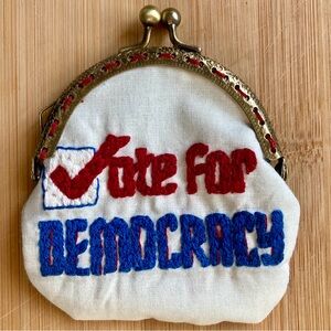 Hand embroidered “Vote for Democracy” coin purse made by me.